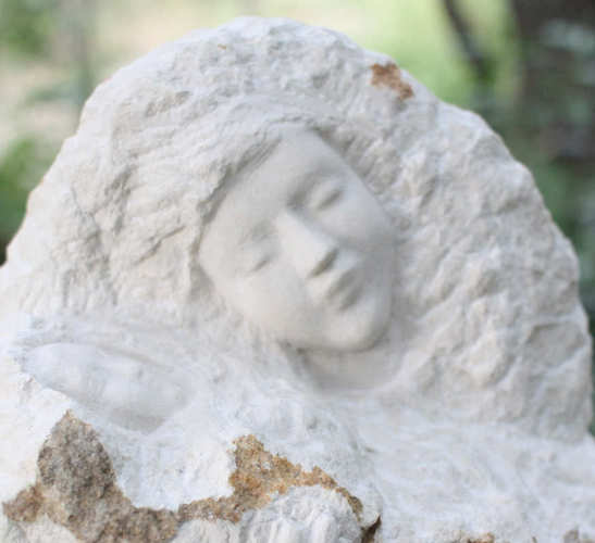 visage scupture statue pierre