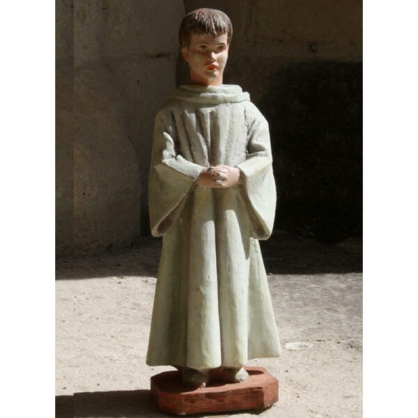 sculpture d'enfant servant d'autel en aube blanche statue