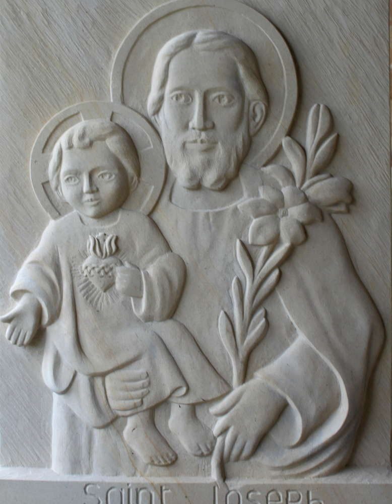sculpture en pierre de saint joseph au sacré coeur de jesus