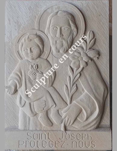 sculpture de st joseph en bas relief de pierre
