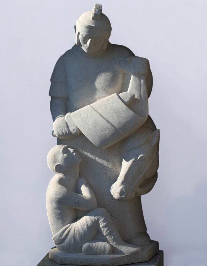 statue de saint martin en pierre partageant son manteau