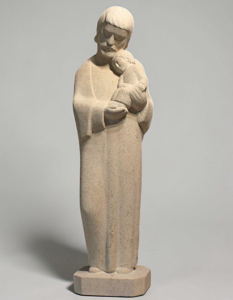 sculpture de st joseph en pierre de bourgogne portant l'enfant