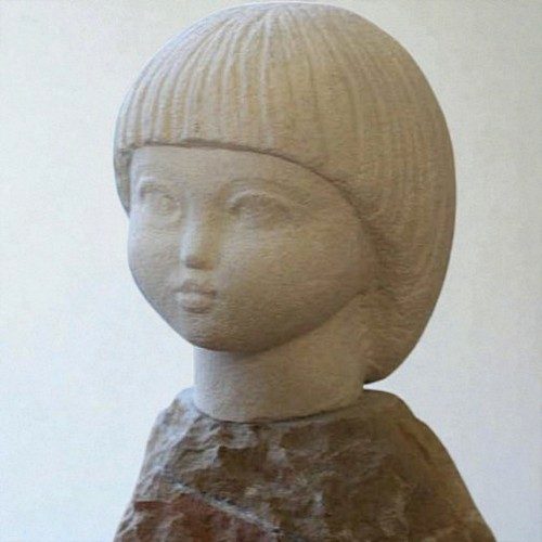 tete d'enfant en pierre